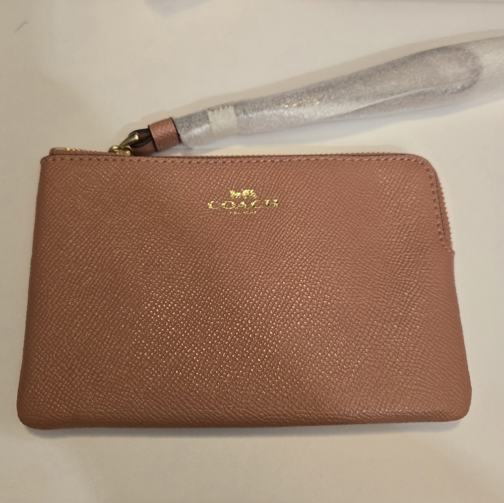Coach Blush Pink Wristlet with Gold Accents